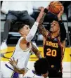  ?? MARCIO JOSE SANCHEZ/AP ?? Hawks forward John Collins (right) is likely to get a substantia­l offer this summer as the top power forward on the market.