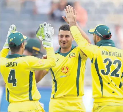  ?? Picture: AAP/Richard Wainwright ?? Australian cricketers celebrate at dismissing Aiden Markram of South Africa during the first oneday internatio­nal match between Australia and South Africa on Sunday.