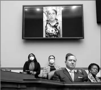  ?? ANDREW HARNIK / ASSOCIATED PRESS ?? Miah Cerrillo, a fourth-grade student at Robb Elementary School in Uvalde, Texas, and survivor of last month’s mass shooting there, appears on a screen June 8 during a House Committee on Oversight and Reform hearing on gun violence.