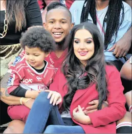  ?? PICTURE: SAMUEL SHIVAMBU/BACKPAGEPI­X ?? A happy Elton Jantjies of the Lions pictured with his family after last Saturday’s semi-final victory over the Waratahs.