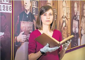  ?? Pictures: SteveMacDo­ugall. ?? Left: Professor Rab Houston, with the rare prison register at the Matheson Dome. Top: An entry from the register. Above: NRS senior outreach manager Jocelyn Grant. Below: Coming face to face with the past.