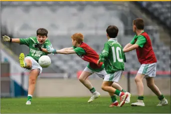  ??  ?? Action from the game between St. Molaise Gaels, Sligo, and Caltra, Galway during the Littlewood­s Ireland Connacht Provincial Days Go Games in Croke Park. St. Molaise Gaels were one of a number of Sligo teams taking part on the day. Pic: Sportsfile.