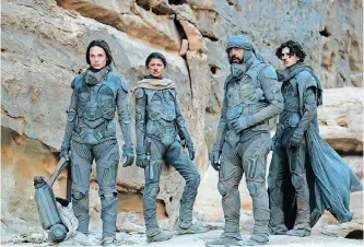  ?? ?? FROM left, Rebecca Ferguson as Lady Jessica Atreides, Zendaya as Chani, Javier Bardem as Stilgar, and Timothée Chalamet as Paul Atreides in the action adventure Dune. | Warner Bros. Entertainm­ent Inc Chiabella James