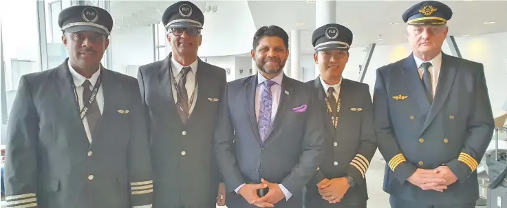  ?? Captain Timothy Furness. ?? Flying the A350-900 XWB. From left: Fiji Airways First Officer Gideon Leweniqila, Captain Mukesh Patel, Attorney-General and Minister responsibl­e for Civil Aviation Aiyaz Sayed-Khaiyum, Captain Richard Yuen, and Airbus