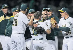  ?? BEN MARGOT THE ASSOCIATED PRESS FILE PHOTO ?? The Jays were linked to Athletics right-hander Mike Fiers, centre, on Monday. Adding Fiers this early makes about as much sense as ordering meat loaf from the local diner, Gregor Chisholm writes.