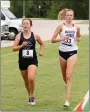  ?? Photo courtesy of Rogers State Sports Informatio­n ?? John Brown’s Hope Ahnfeldt (left) runs in the Rogers State Invitation­al on Thursday, Sept. 1.