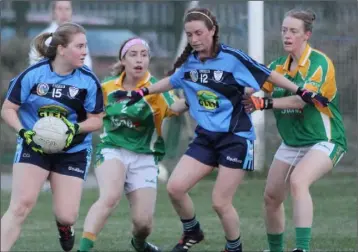  ??  ?? Trina Gaul on the ball for St. Anne’s as Clonee defenders Danielle Hayden and Marguerite Doyle close in.