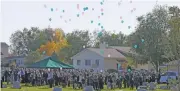  ?? (AFP) ?? Mourners release balloons after a prayer service of a 35 year old woman in Enoch, Utah on Friday