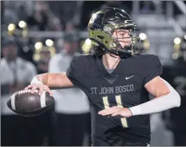  ?? PHOTO BY SCOTT VARLEY ?? St. John Bosco QB Katin Houser looks for a receiver in the Braves’ D1quarterf­inal victory.