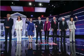  ?? Photograph: Joe Raedle/Getty Images ?? The candidates at the Tyler Perry Studios in Atlanta. Sankara Lumumba, who watched the debate, said the debates had largely become about ‘who can beat Trump’.