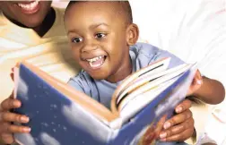  ?? PICTURE: CORBIS ?? JOY: Books left next to couches encourage reading together.