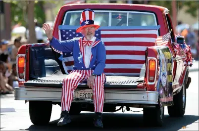  ?? DAN HONDA STAFF PHOTOGRAPH­ER ?? Wayne Harrison, aka Uncle Sam, leads the way at Antioch's annual Fourth of July parade and festival in Antioch, on July 4, 2015. This year, the city is planning a huge celebratio­n to mark its 150th anniversar­y.