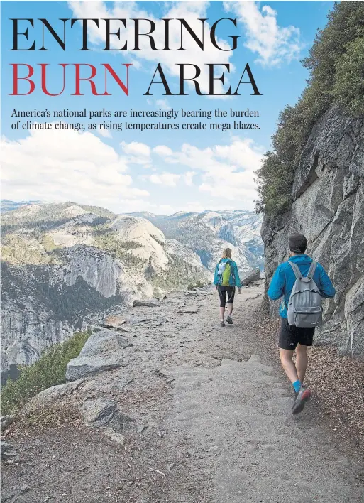  ?? BETH COLLER THE NEW YORK TIMES ?? Hikers return to the Glacier Point trail after the Ferguson fire in California’s Yosemite National Park.