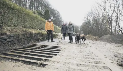  ??  ?? GRIDLOCK: Some of the club’s members who are wanting the cattlegrid removed from the Ripponden footpath