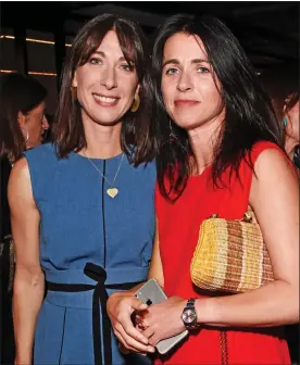  ??  ?? CLOSE: Emily, right, with sister and fellow fashionist­a Samantha at a 2018 party