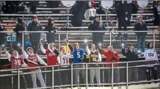  ?? Michael M. Santiago/Post-Gazette ?? Fans in the Upper St. Clair student section sing a goodbye song directed at North Hills players during the Upper St. Clair vs. North Hills WPIAL Class 5A high school football playoff game on Nov. 1, 2019, at Martorelli Stadium in Ross.