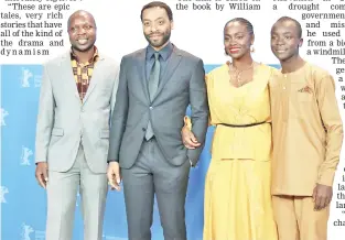  ??  ?? Ejiofor (second left) and actors William Kamkwamba (left to right), Maxwell Simba, Aissa Maiga pose during a photocall to promote ‘The Boy Who Harnessed the Wind’ at the Berlin festival, on Tuesday. — Reuters photo