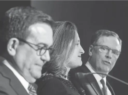  ?? GRAHAM HUGHES / THE CANADIAN PRESS FILES ?? Foreign Affairs Minister Chrystia Freeland and Mexico’s Secretary of Economy Ildefonso Guajardo Villarrea, left, and United States Trade Representa­tive Robert Lighthizer have full schedules this month, meaning it is likely that high-level NAFTA talks...