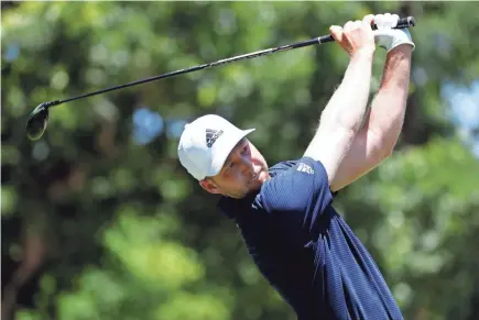  ?? RAYMOND CARLIN III/USA TODAY SPORTS ?? Daniel Berger tees off on the third hole Sunday during the final round of the Charles Schwab Challenge at Colonial Country Club. Berger beat Collin Morikawa on the first hole of a playoff to win the event.