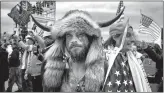  ?? Brent Stirton
/ Getty Images /TNS ?? Jacob Chansley, known as the Qanon Shaman, amid the U.S. Capitol riot in Washington, D.C., on Jan. 6.