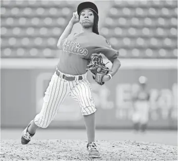  ?? KAREEM ELGAZZAR, THE CINCINNATI ENQUIRER ?? Mo’ne Davis, who stole the show with a shutout in the 2014 Little League World Series, gave up two runs on one hit and two walks in two innings of relief Tuesday at Great American Ball Park.