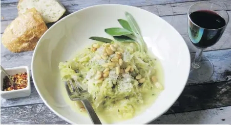  ?? SARA MOULTON VIA ASSOCIATED PRESS ?? As a pasta alternativ­e, spaghetti squash is served with with creamy goat cheese sauce and shredded zucchini.