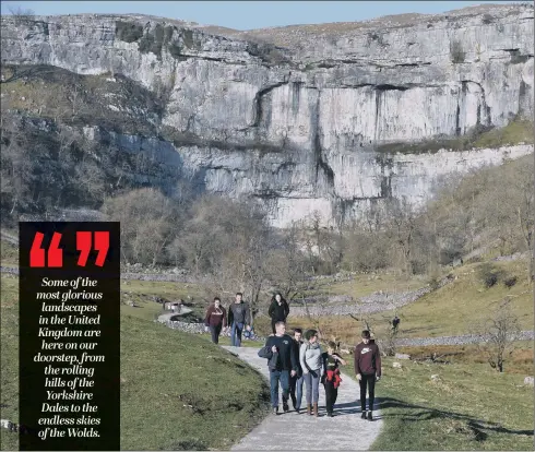  ?? PICTURE: BRUCE ROLLINSON. ?? NORTHERN DELIGHT: Walkers enjoy the spring sunshine at Malham Cove, in a region in which is one of the most wildlife-friendly, research says.