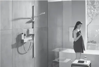  ?? Foto: Hansgrohe SE/VDS/dpa ?? Dusch-Set von Hansgrohe kombiniert Handbrause und Thermostat.