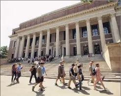  ?? Steven Senne / Associated Press ?? Students and parents have benefited from changes during the pandemic and loan forgivenes­s may occur in 2021.