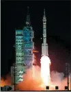  ?? LI GANG / XINHUA ?? The Long March 2F carrier rocket carrying Shenzhou XV blasts off from the Jiuquan Satellite Launch Center on Tuesday.