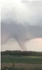  ?? BRYAN MOZDZEN ?? A tornado touches down near Alonsa, Man., Friday.