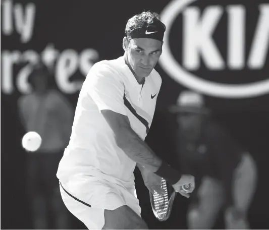  ??  ?? Roger Federer in action during his fourth round match against Marton Fucsovics in the Australian Open on Monday