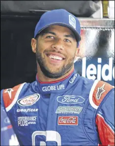  ?? JERRY MARKLAND / GETTY IMAGES ?? Darrell Wallace (above) will fill in for Aric Almirola in the No. 43 car. Almirola fractured his vertebrae in a crash May 13 at the Kansas Speedway.