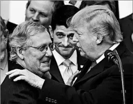  ?? MANUEL BALCE CENETA/ASSOCIATED PRESS ?? For President Donald Trump and Republican leaders like Kentucky Sen. Mitch McConnell, left, the tax overhaul was the highlight of a year marked by legislativ­e fits and starts.