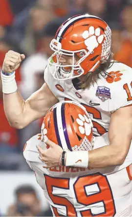  ?? MATTHEW EMMONS/USA TODAY SPORTS ?? Clemson QB Trevor Lawrence (16) ran for one TD and threw for 2 in the Fiesta Bowl.