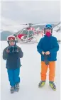  ??  ?? Better than the bus: the Ross boys travel by helicopter