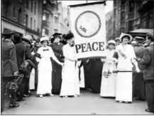  ?? PHOTO COURTESY OF THE LIBRARY OF CONGRESS ?? Participan­ts in a women’s peace parade down Fifth Avenue, New York City (August 1914).
