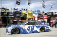  ?? COLIN E. BRALEY — THE ASSOCIATED PRESS ?? Jimmie Johnson drives back to the garage during practice for the NASCAR Monster Cup auto race at Kansas Speedway in Kansas City, Kan., Friday.
