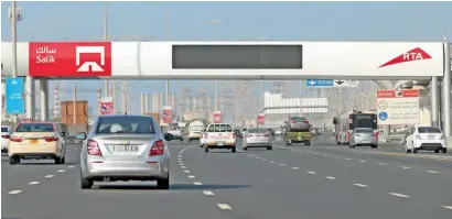  ?? — Photo by Dhes Handumon ?? The new Salik gate in Jebel Ali, along the Sheikh Zayed Road, began charging Dh4 from 12am on Wednesday.