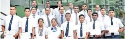  ??  ?? Medal winners (front row) with SLITHM Chairman Sunil Dissanayak­e (centre second row) and SLITHM DG Buddhika Hewawasam and faculty members