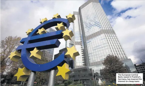  ??  ?? The European Central Bank, based in Frankfurt, Germany, has lowered the interest on cheap loans