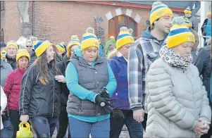  ?? MAUREEN COULTER/TC MEDIA ?? A group of about 250 people leaves Central Christian Church in Charlottet­own to take part in the Coldest Night of the Year walk Saturday.