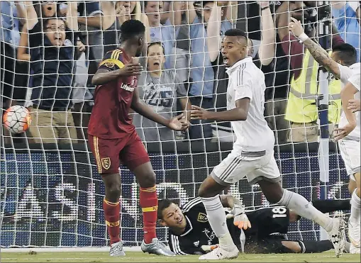  ?? — RICH SUGG/THE KANSAS CITY STAR FILES ?? Sporting Kansas City’s Soni Mustivar, right, reacts to his header goal against Real Salt Lake on Wednesday. Mustivar and K.C. face the Vancouver Whitecaps in Kansas City on Saturday.