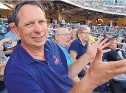  ?? GREG SORBER/JOURNAL FILE ?? From left, Mike Piscotty, Ken Kloeppel and Gretchen Piscotty watch the Piscottys’ son Stephen play for Memphis at Albuquerqu­e in August 2014.