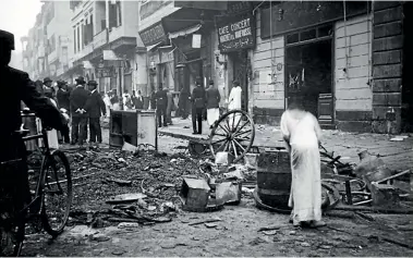  ?? PHOTO: AUSTRALIAN WAR MEMORIAL ?? This photo is thought to show the aftermath of the 1915 Cairo riot by Anzac soldiers. The white figure on the right is likely a woman connected to the city’s sex trade.