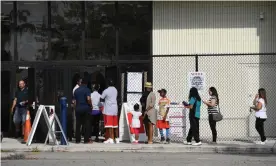  ??  ?? Voters enter polling stations in Florida. Photograph: Larry Marano/REX/Shuttersto­ck