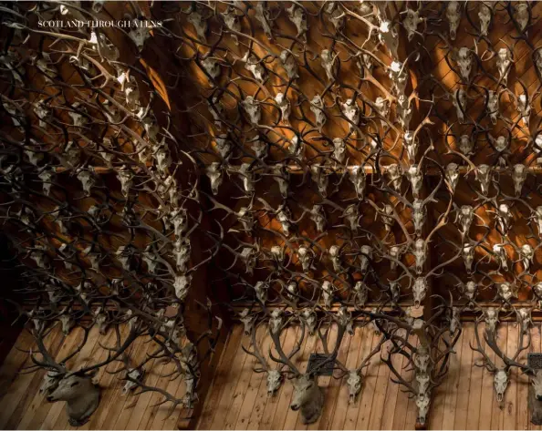  ??  ?? Above: The Mar Lodge stag ballroom has a spectacula­r 2,435 red deer stags heads lining the walls and ceiling. Right: Cutting peat on the Isle of Lewis.