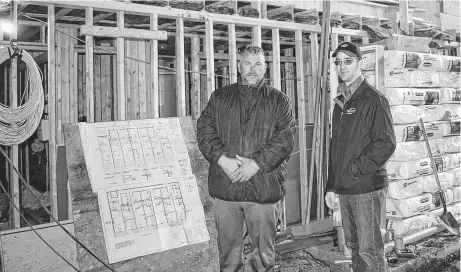  ?? KEVIN ADSHADE/THE NEWS ?? Tim Tanner, left, and Marlin Plett stand on what used to be the gymnasium at Temperance Street School.