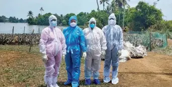  ?? ?? Members of a rapid response team get ready to cull ducks in Alappuzha on Tuesday following the outbreak of bird flu in the district.