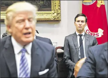  ?? AP ?? White House senior adviser Jared Kushner (right) listens to President Donald Trump speak during a breakfast with business leaders at the White House in Washington. Trump is set to announce a new White House office run by his son-in-law, Kushner, that...